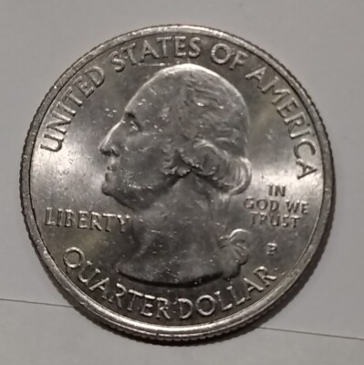 2019 quarter off-center strike error with blank crescent of unstruck metal on right edge